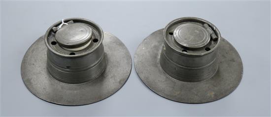 A pair of Victorian pewter capstan ink wells